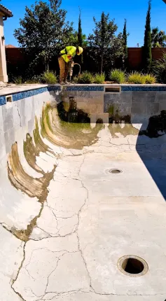 Swimming pool renovation with new tiling under way in Doha